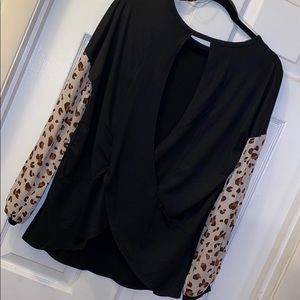 Open back top with animal print sleeves